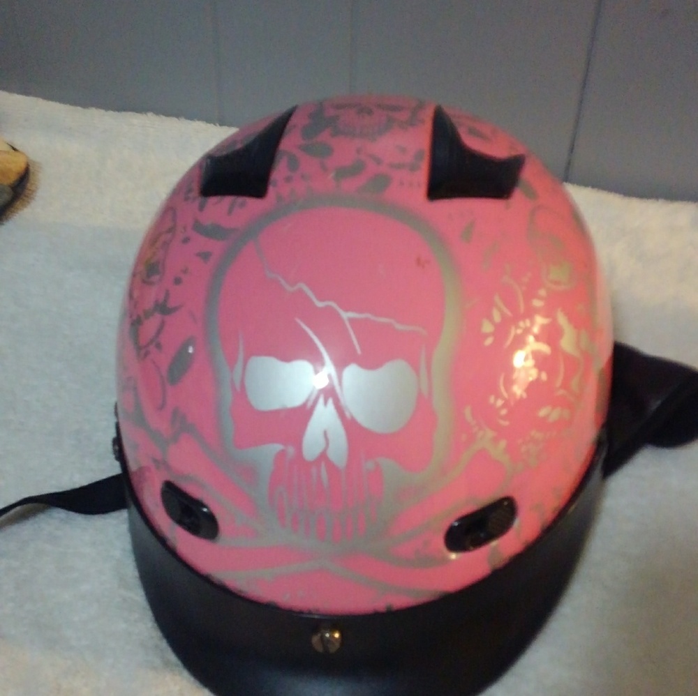 Pink skull motorcycle helmet